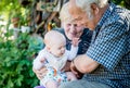 Grandparents and grandson, happy smiling family