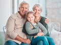 Grandparents, hug and portrait on couch with girl, care and bonding with love, retirement and home living room. Happy