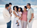 Grandparents, kids and parents at beach, big family or talk with smile, care or bonding on vacation. Mother, father and Royalty Free Stock Photo