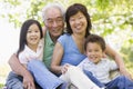 Grandparents laughing with grandchildren Royalty Free Stock Photo