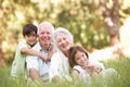 Grandparents In Park With Grandchildren Royalty Free Stock Photo