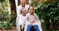 Grandparents, park and a senior man in a wheelchair together with his wife and adorable granddaughter. Person with a Royalty Free Stock Photo