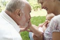 Grandparents Playing With Granddaughter Royalty Free Stock Photo