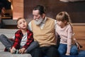 Grandparents playing and having fun with their granddaughter