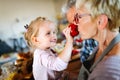 Grandparents playing and having fun with their granddaughter Royalty Free Stock Photo
