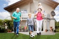 Grandparents Playing Soccer With Their Grandchildren Royalty Free Stock Photo