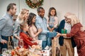 happy beautiful grandparents presenting gifts to Royalty Free Stock Photo