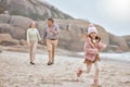 Grandparents, running kid and beach holiday, vacation and relax together for bonding, freedom or family time outdoors Royalty Free Stock Photo