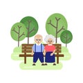 Grandparents are sitting on a bench in the park.