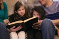 Family reading the bible together Royalty Free Stock Photo