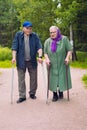 Grandparents walking with crutches