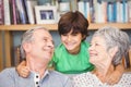 Grandson with grandparents at home