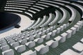 The grandstands of a modern outdoor amphitheater, a stage for small entertaining events, performances, concerts or presentations