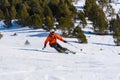 Skier in mountains, prepared piste and sunny day in Grandvalira, Andorra...I