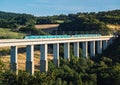 Panoramic view on passenger train TGV crossing the railway flyover. Royalty Free Stock Photo