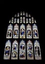 19th century stained glass window dedicated to saints and the natisrtmel priory in cumbria Royalty Free Stock Photo