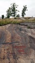 Granite bedrock Aspeberget in Tanumshede with rock paintings in Sweden