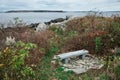 Granite Bench With View on Peaks Island in New England Autumn Seascape Royalty Free Stock Photo