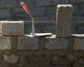 Granite blocks wall construction with mortar Royalty Free Stock Photo