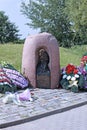 Granite boulder with a bronze icon of the Mother of God