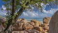 Granite boulders piled up on a tropical beach. Royalty Free Stock Photo