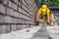 Granite Brick Paving Worker Royalty Free Stock Photo