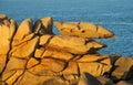 Granite coast rocks at sunset Royalty Free Stock Photo