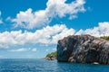 Granite coastline view of the tropical island of Marianne in Seychelles with blue sky