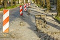 Granite cobblestone pavement repair in city street Royalty Free Stock Photo