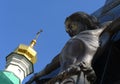 Granite crucifixion of Isus Christ on a blue background Royalty Free Stock Photo