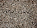 Granite crumb in the wall. Granite stone, wall of granite