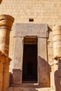 Granite door with polychrome relief