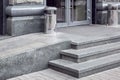 Granite gray porch step with a foot mat at the entrance. Royalty Free Stock Photo