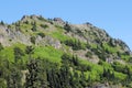 Granite and Green Hillside Royalty Free Stock Photo