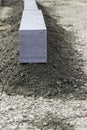 Granite kerb stone at construction site Royalty Free Stock Photo