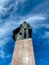 Granite monument to Vladimir Lenin and blue sky bottom view Royalty Free Stock Photo