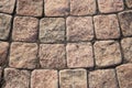 Granite new small cobblestone pavers. abstract background texture square paving stones