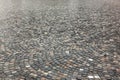 Granite pavement after rain Royalty Free Stock Photo