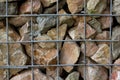 Granite retaining wall reinforced with steel grid Royalty Free Stock Photo