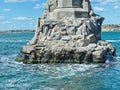 Granite rock in the sea - the base of the of the Monument `To the sunken ships`, an architectural symbol of the city built in 1905 Royalty Free Stock Photo