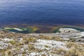 Granite shore of Ladoga Lake, Karelia, Russia. Royalty Free Stock Photo