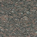 Granite with a speckled pattern of pinkish-red, black, and gray minerals. The texture is Royalty Free Stock Photo