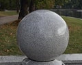 Granite sphere on the embankment of the Top lake in Kaliningrad (Russia).