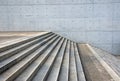 Granite stairs and a concrete wall