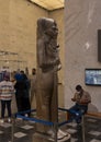 Granite statue of Khonsu, God of the moon, on display in the National Museum of Egyptian Civilization in Cairo, Egypt.