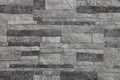 Granite stone gray decorative brick wall Royalty Free Stock Photo