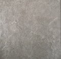 Granite stone wall gray black color rough surface texture material background Royalty Free Stock Photo