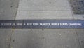 Granite strip commemorates the New York Yankees` 25th World Series championship ticker-tape parade held along the Canyon of Heroes