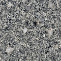 Granite texture featuring interlocking grains of quartz, feldspar, and mica. Predominantly gray Royalty Free Stock Photo