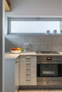 Granite tiles interior in simple kitchen